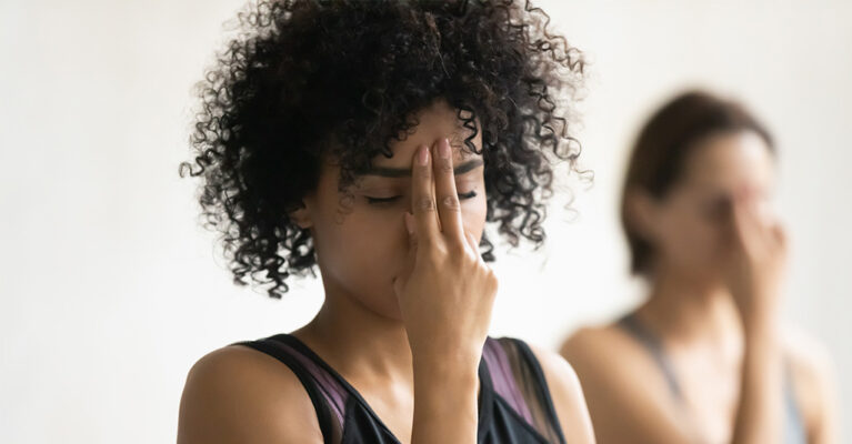Young woman focussing and concentrating