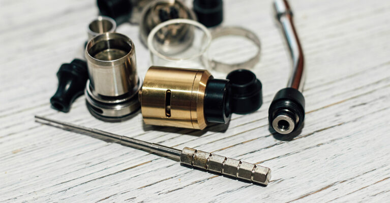 Vaping equipment and accessories scattered