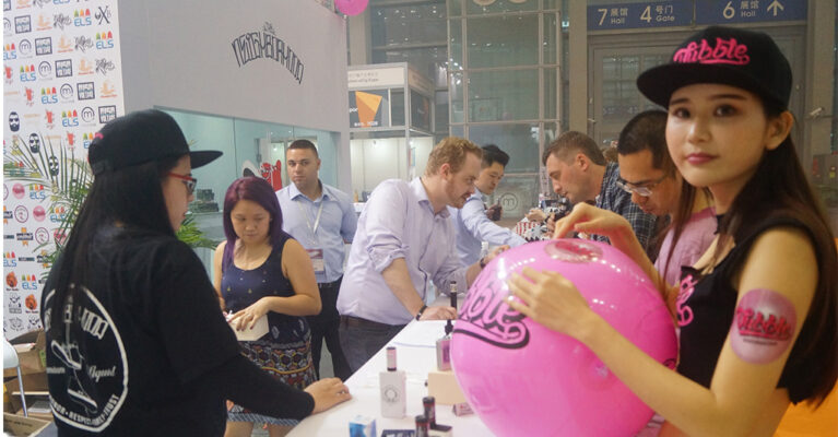 People interacting at a promotional event.