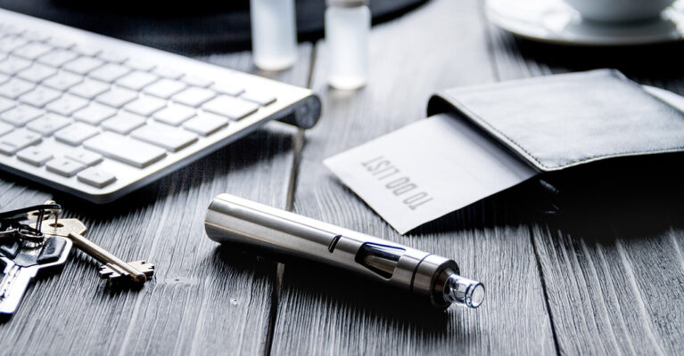 Vape pen on a desk