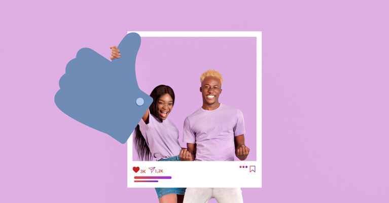 Two people posing with thumbs up.